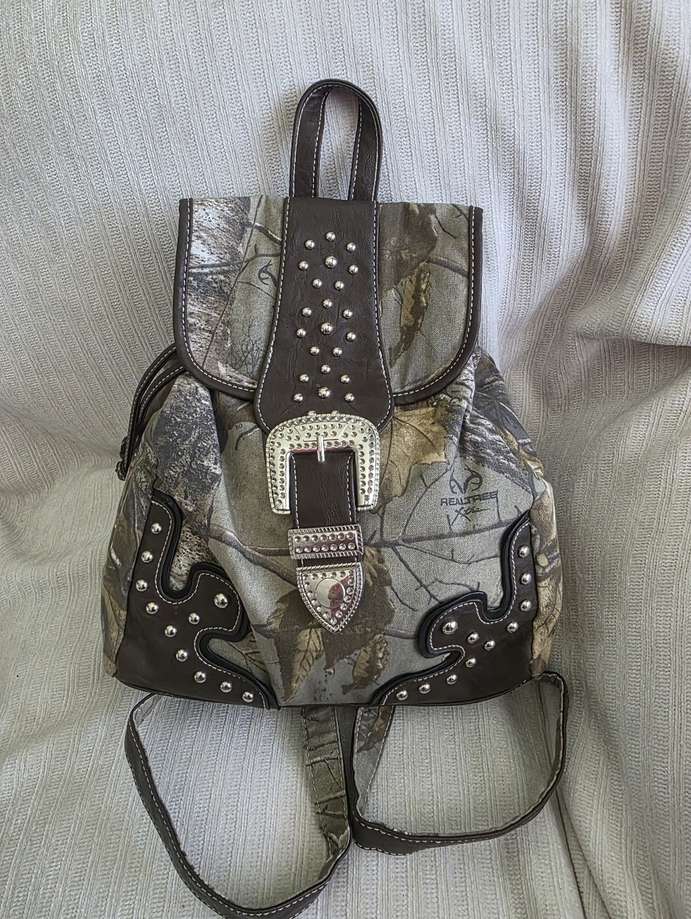 Realtree Camo Backpack with Brown Trim and Silver Studs